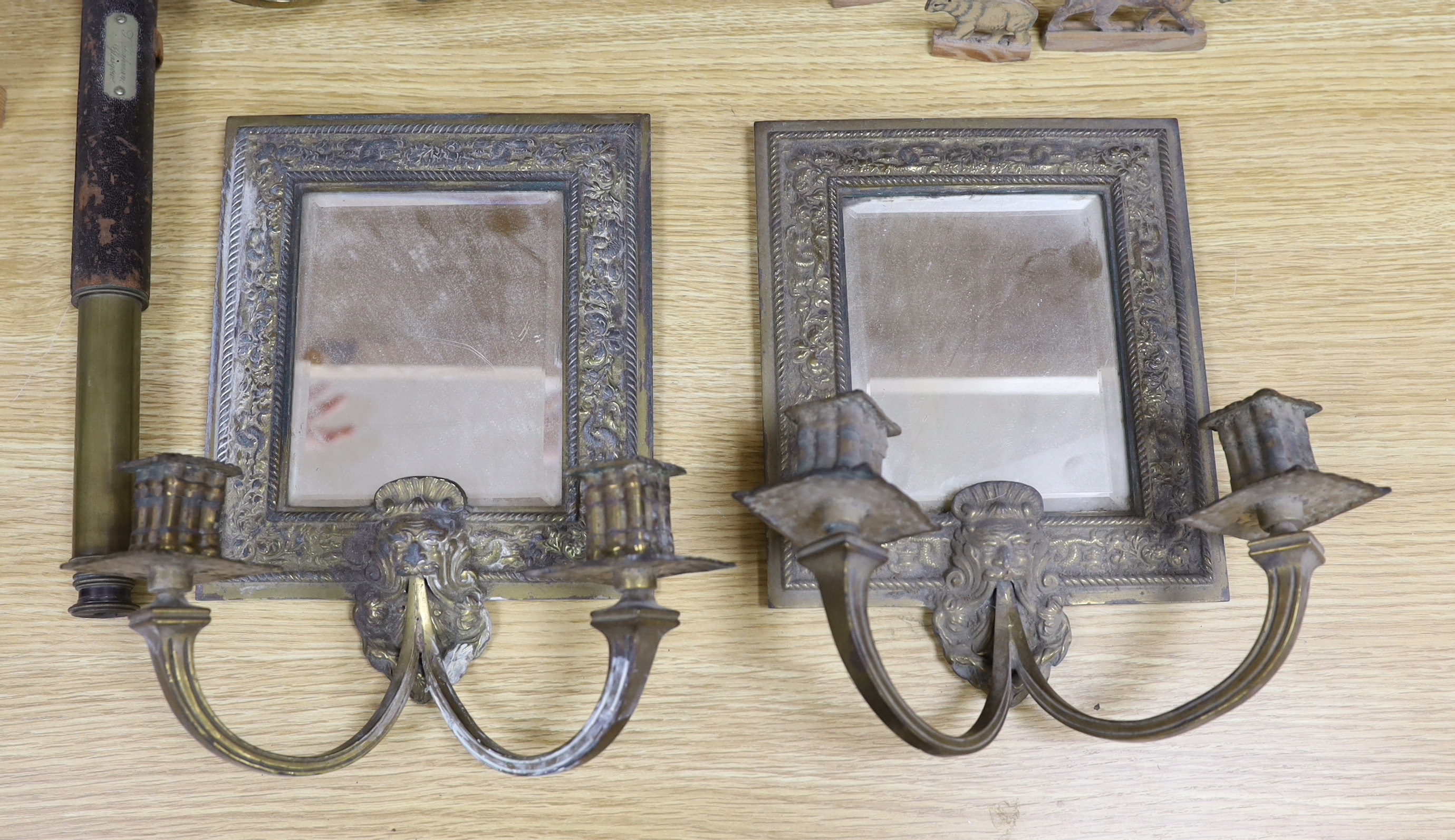 A set of three Victorian mirrored candle sconces together with various other items including a telescope